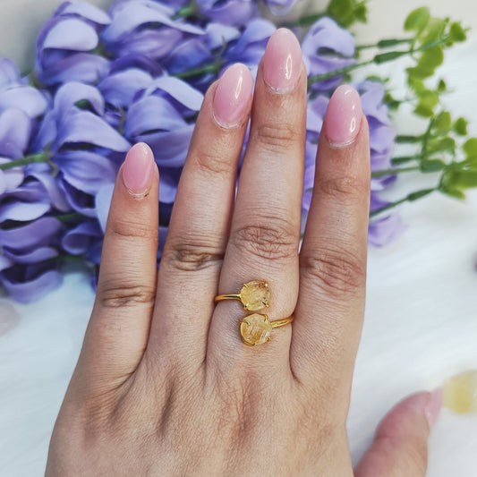 Hand wearing Natural yellow Citrine raw gemstone ring for abundance – Gemsara