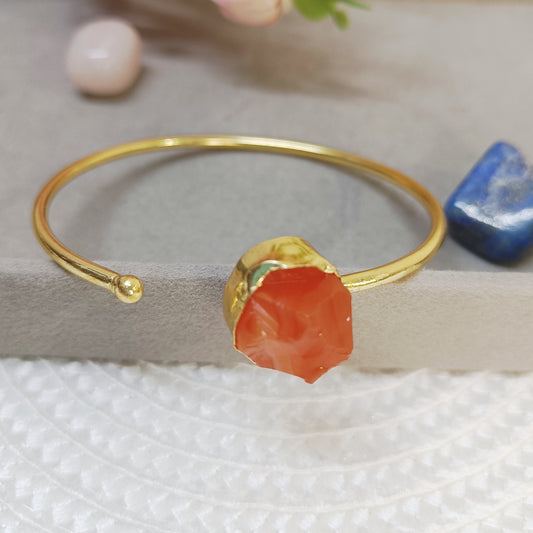 Raw Carnelian cuff bangle in golden brass, adjustable natural crystal bracelet with orange stone