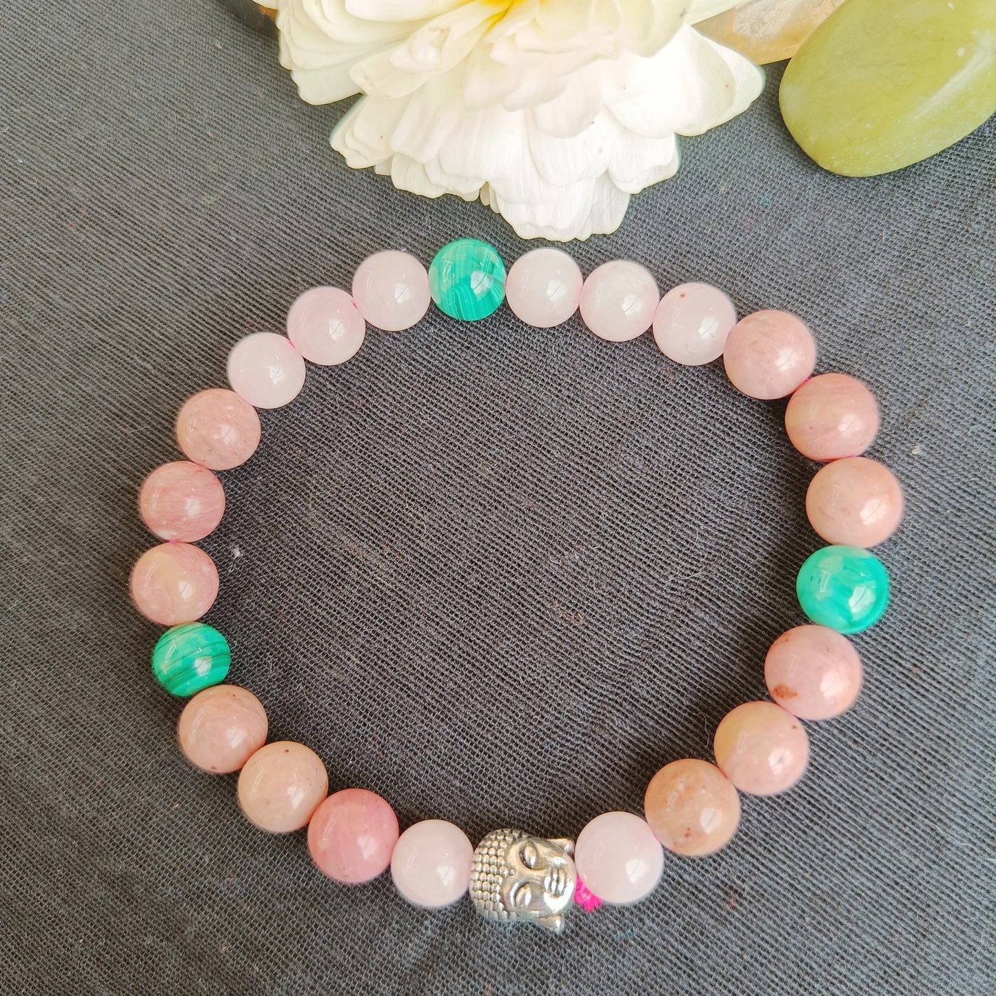 Beaded bracelet with rhodochrosite, rose quartz and malachite. This is heart chakra stone combination