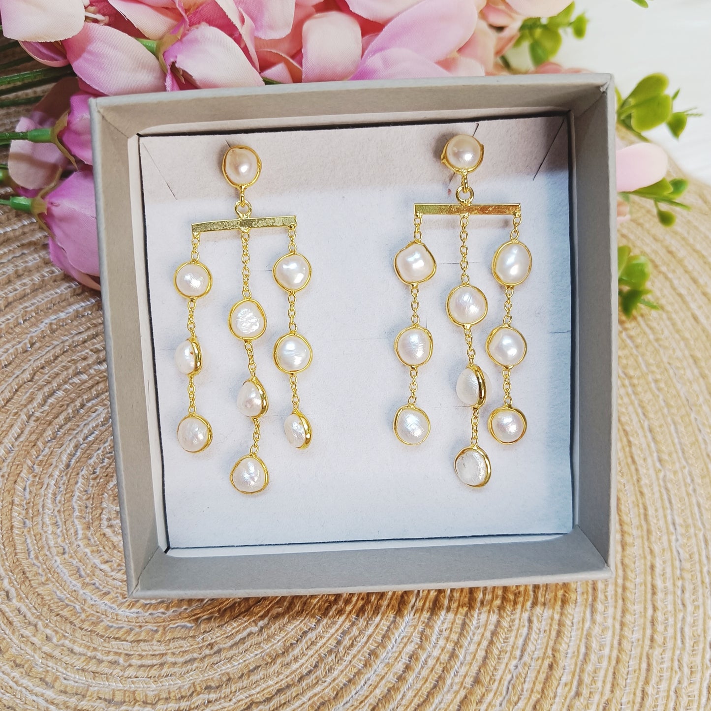 Cascading pearl earrings in golden brass frame, elegant festive jewelry