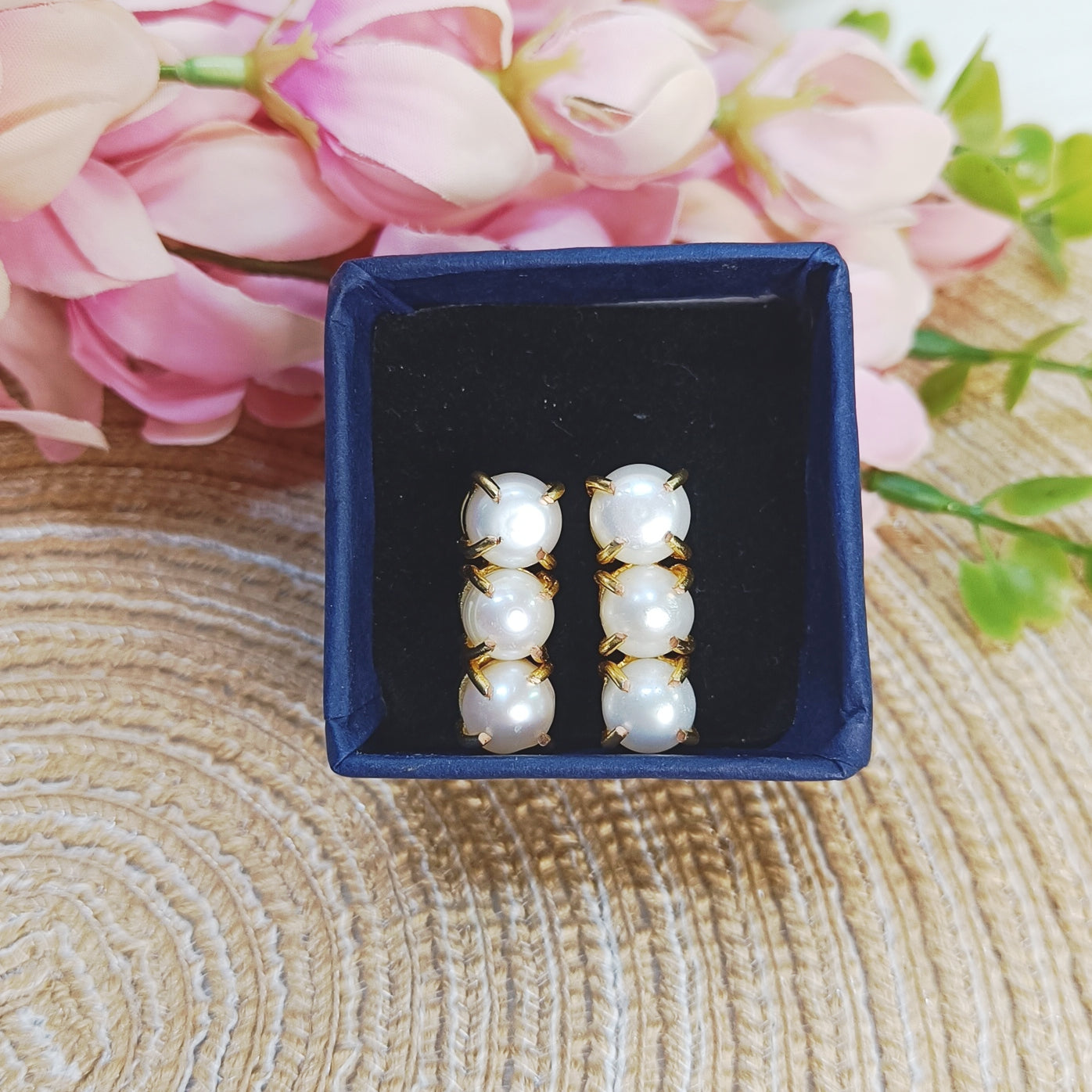 Three-pearl vertical earrings on jute mat — Gemsara handcrafted jewellery