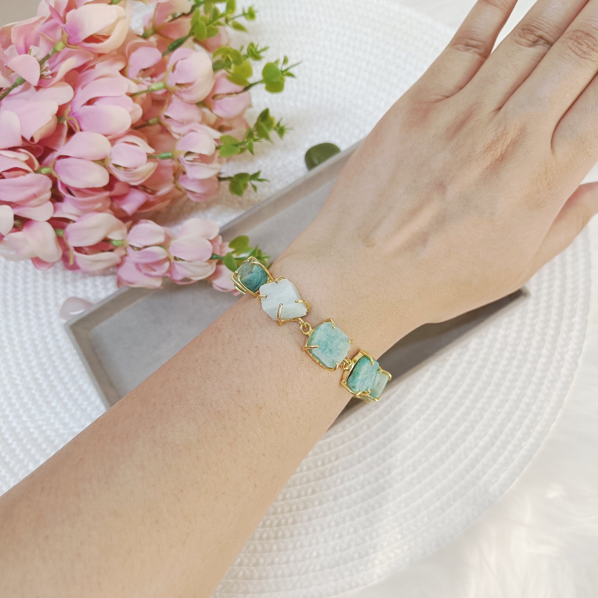 Raw Uncut amazonite crystal bracelet on wrist - Golden sky blue stone bracelet on a wrist