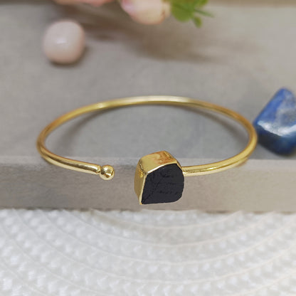 Raw black Tourmaline cuff bangle in golden brass, adjustable natural crystal bracelet with black stone

