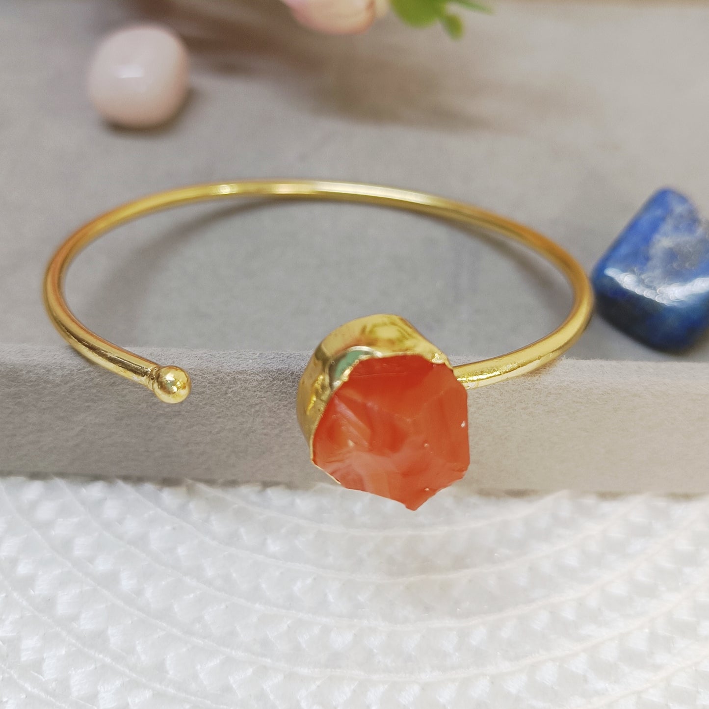 Raw Carnelian cuff bangle in golden brass, adjustable natural crystal bracelet with orange stone