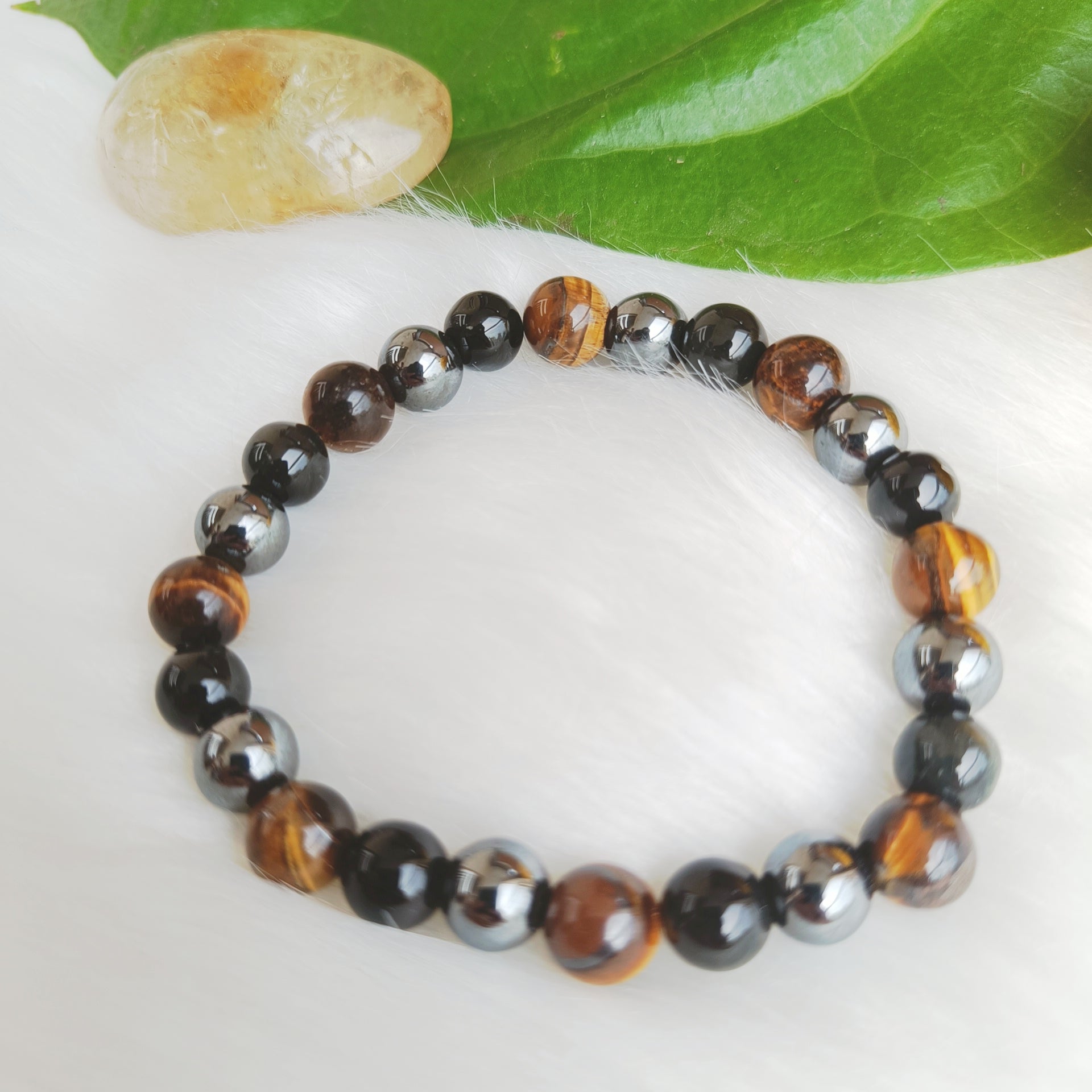 Crystal bracelet for protection - Triple Protection bracelet - a combination of hematite, tiger eye and black obsidian for protection, courage and confidence in daily life from Gemsara