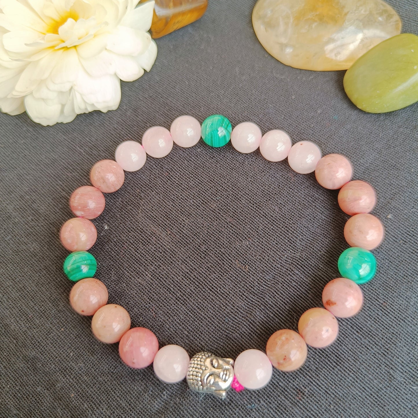 Beaded bracelet with rhodochrosite, rose quartz and malachite. This is heart chakra stone combination with a Buddha bead - handcrafted with love at Gemsara