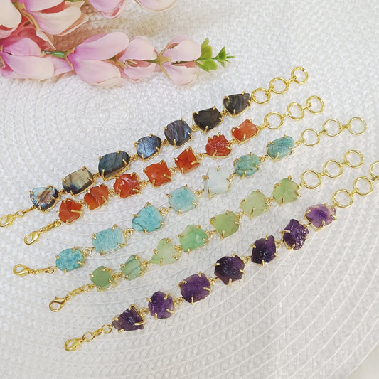 Raw uncut crystal bracelets in carnelian, labradorite, amethyst, fluorite, and amazonite on brass bands. Multicolor stone brass bracelet