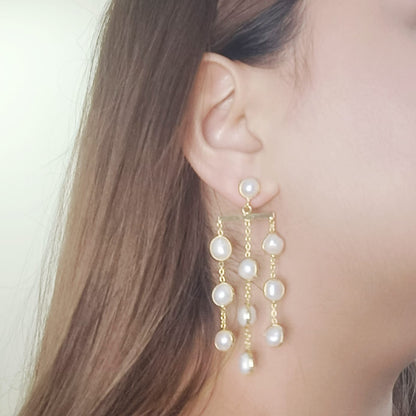 woman wearing Real freshwater pearl waterfall earrings, Gemsara jewelry.