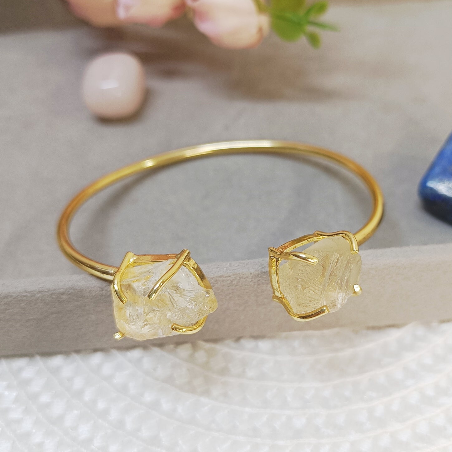 Gold-plated brass bracelet with natural yellow citrine crystal, adjustable handcrafted bangle.