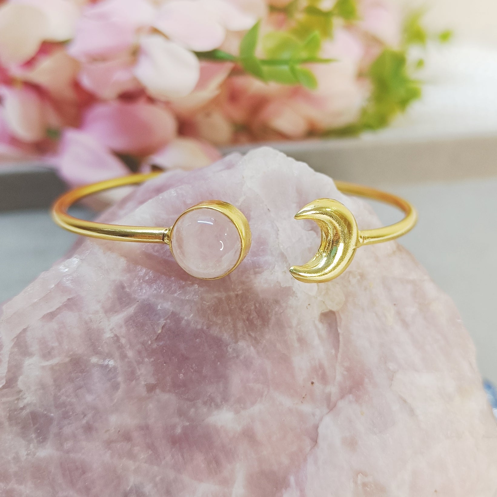 Gold-plated adjustable bracelet with natural Rose quartz crystal and brass moon charm on a pink stone